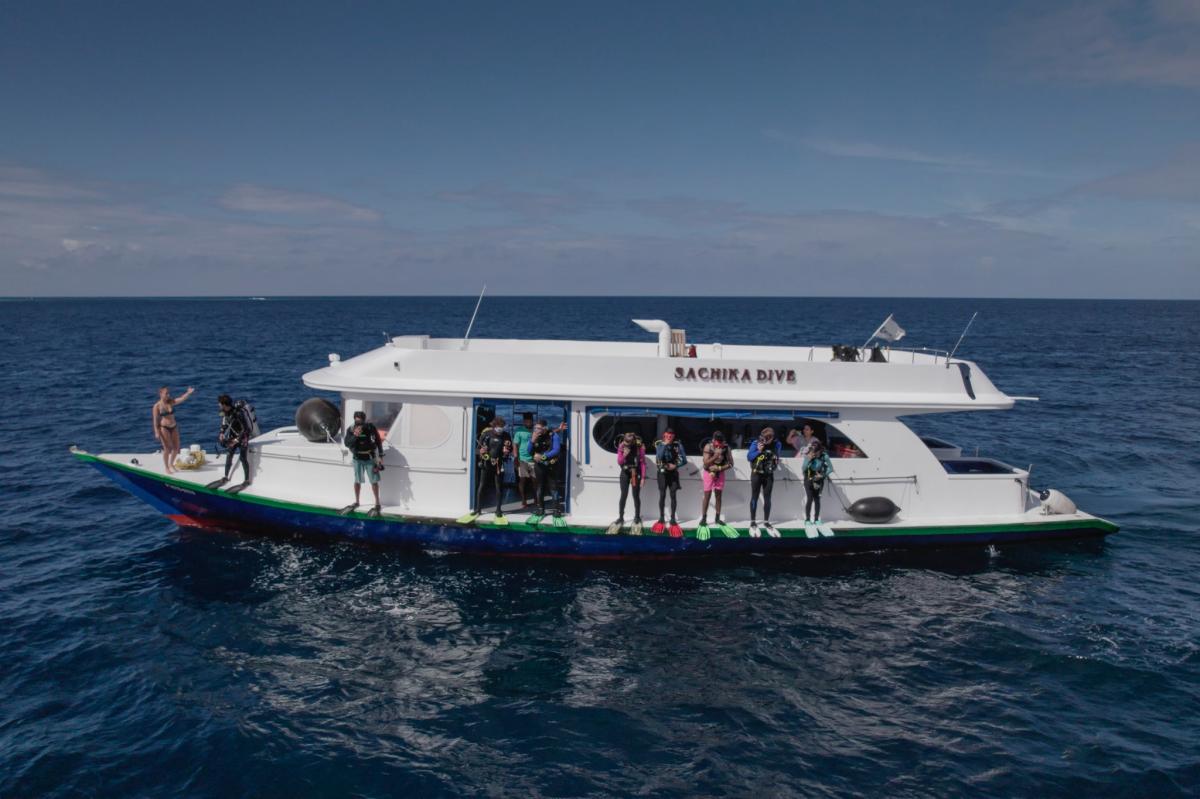 Top-down image of the sachika dive dhoni anchored next to the main vessel.